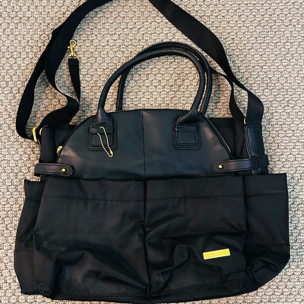 Skip Hop Black Baby Bag with Adjustable Straps and Durable Fabric